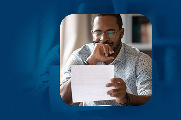 HowtoGet630 A man looking at a document