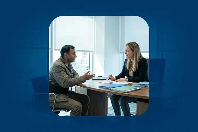 A man explains his disability situation to a social security attorney during a free consultation
