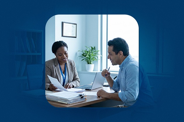 A social worker reviews ssdi documentation with a client during a disability benefits referral consultation